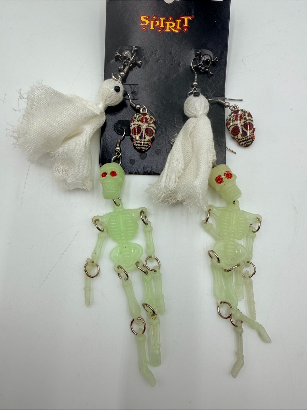 Spirit Halloween 4 Pack earrings Skeleton Ghost Skulls and Skull Stud Earrings